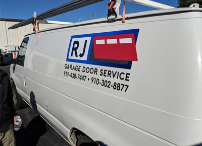RJ Garage Door Service Car Close Up View
