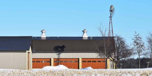 Accommodating Oversized Farm Machinery with Custom Garage Doors RJ Garage Door Service