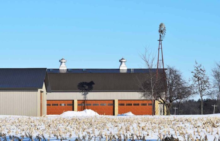 Accommodating Oversized Farm Machinery with Custom Garage Doors RJ Garage Door Service