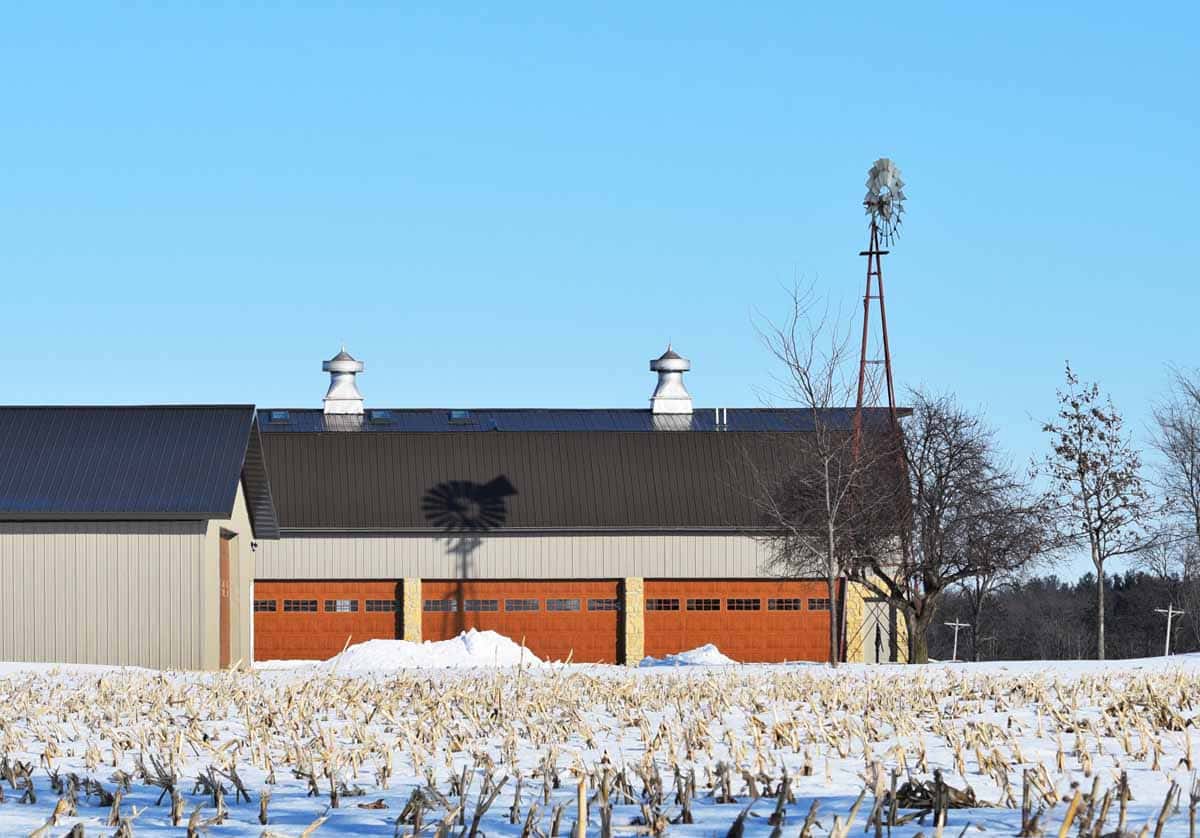 Accommodating Oversized Farm Machinery with Custom Garage Doors RJ Garage Door Service