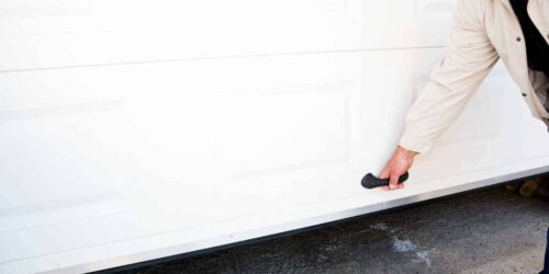 hand opens pvc garage door manually