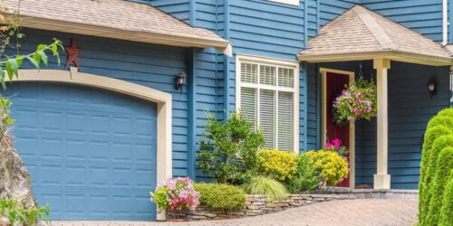 Fragment of a very neat and colorful home with gorgeous outdoor landscape in suburbs of Vancouver, Canada