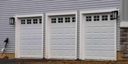 installed new garage doors house wall metal modern