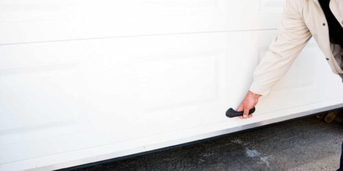 hand opens pvc garage door manually
